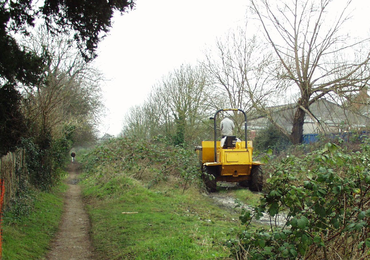 Towpath alongside filled-in canal. (Cotswold Canals Trust)